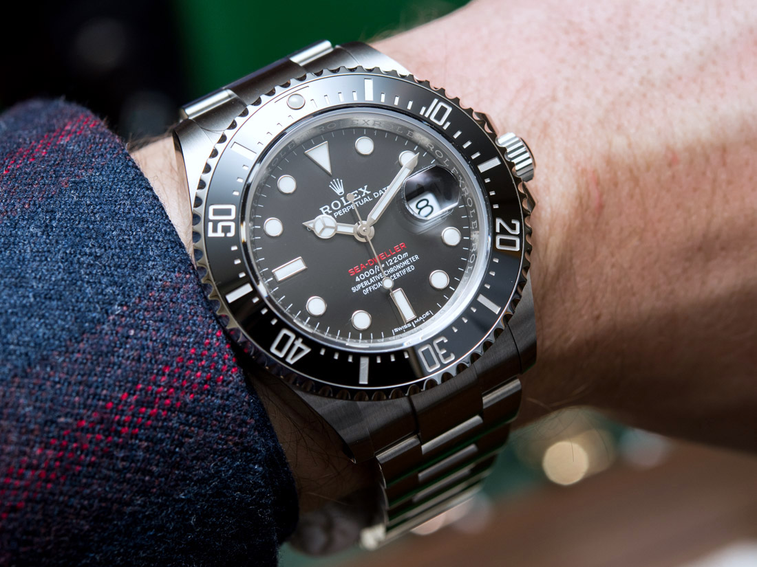 The Oystersteel fake Rolex watches have black dials.