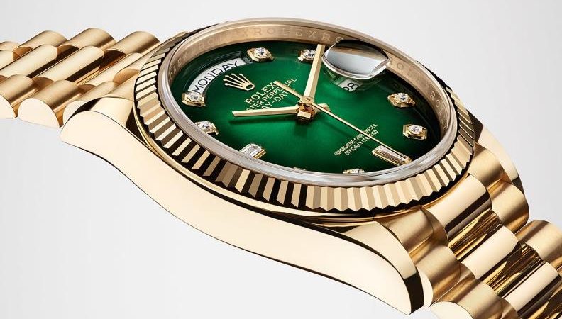 The 18ct gold copy watches have green dials.